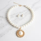 Gold Sunburst Cream Pearl Pendant Necklace
