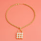 Cream Pearl Studded Lock Necklace